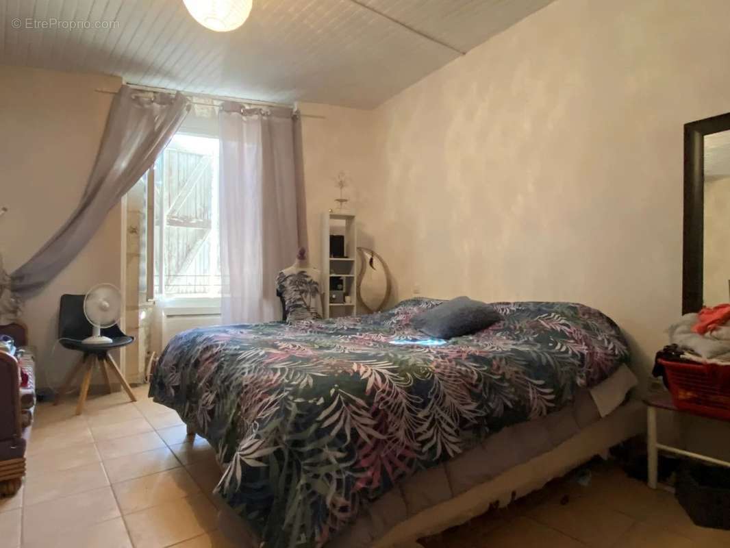 Maison à CASTELNAU-MONTRATIER