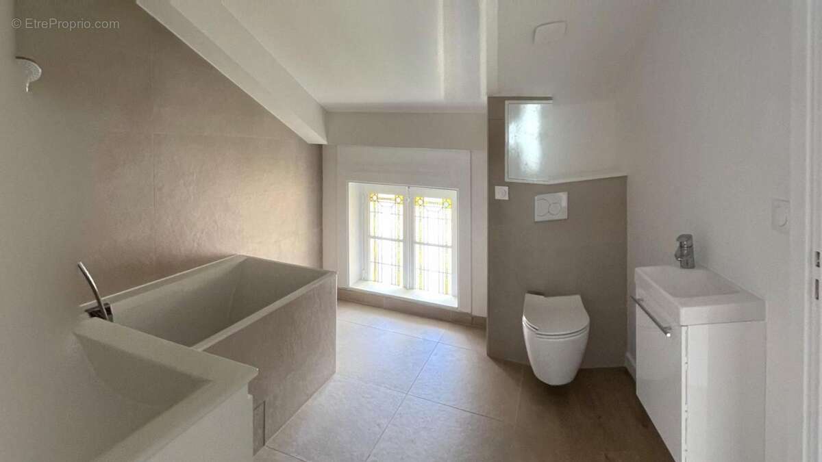  EXCLUSIVITÉ – T5 de Prestige de 117 m² avec Jardin Privatif dans une Maison de Maître Réhabilitée - photo 3