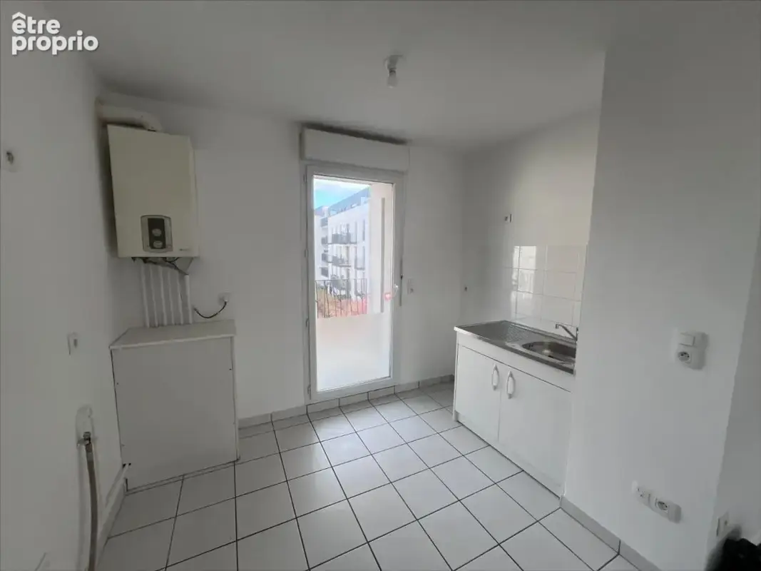 Appartement 3 pièces 66 m² à vendre à Reims (51100) - photo 2