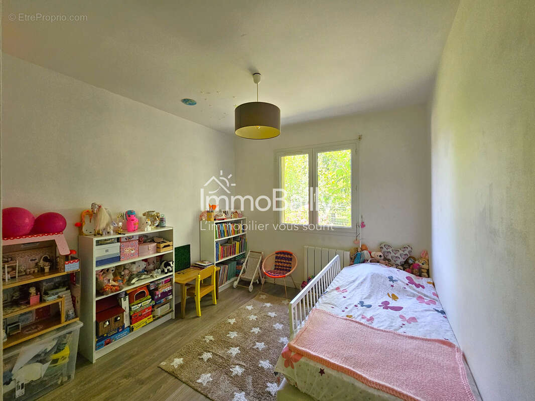 Maison familiale de plain-pied   5 chambres   Terrain de 1 672 m2  en lisière de forêt - photo 7