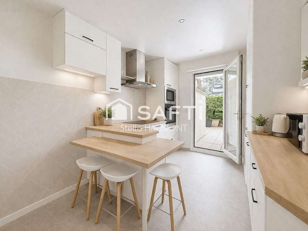 Photo 6 - Appartement à COURBEVOIE