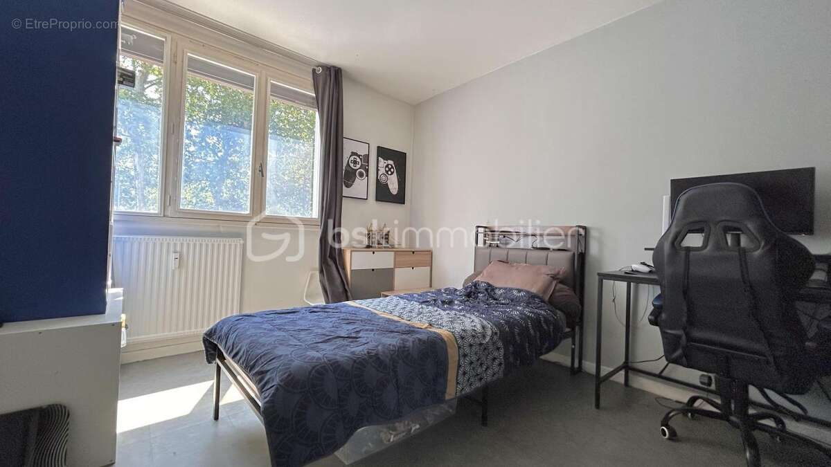 Spacieux T5 de 105 m² avec place de parking et cave – Résidence sécurisée - photo 10