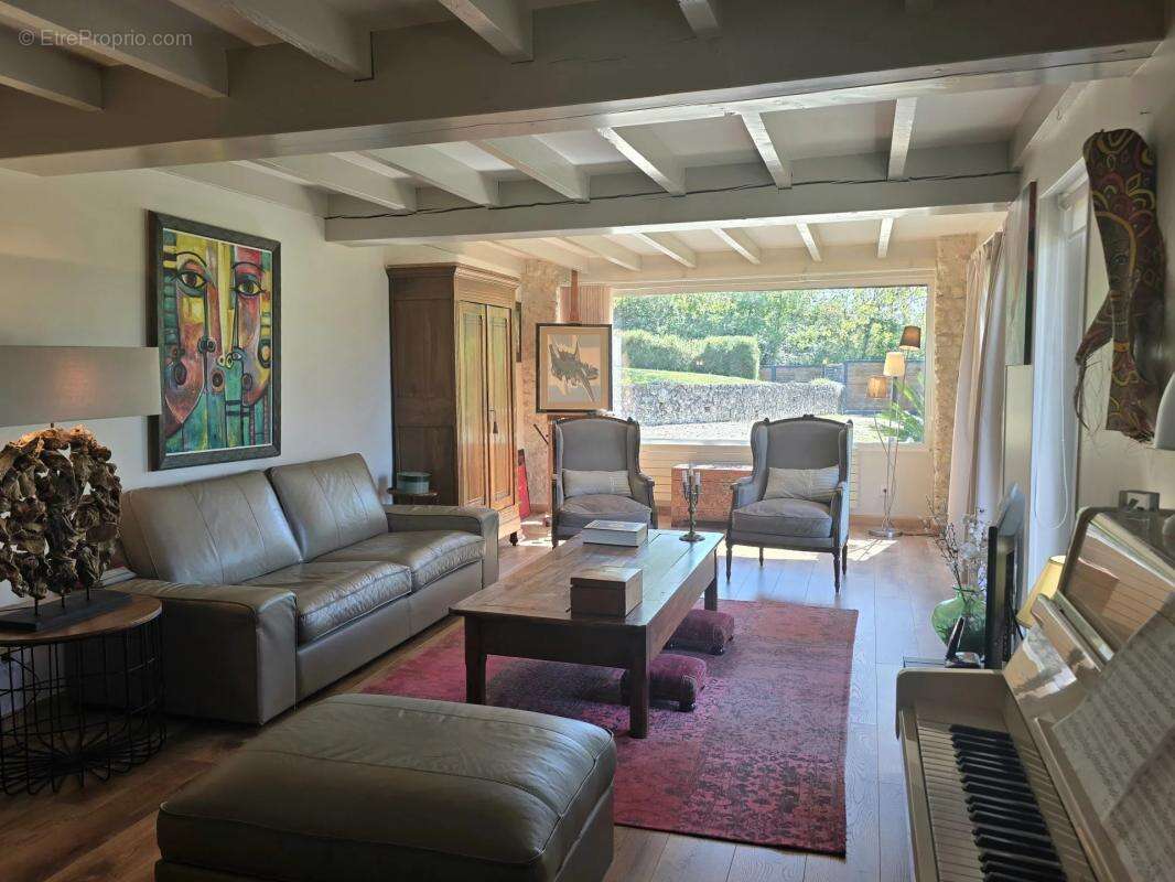 Maison à SAINT-LAURENT-DES-COMBES