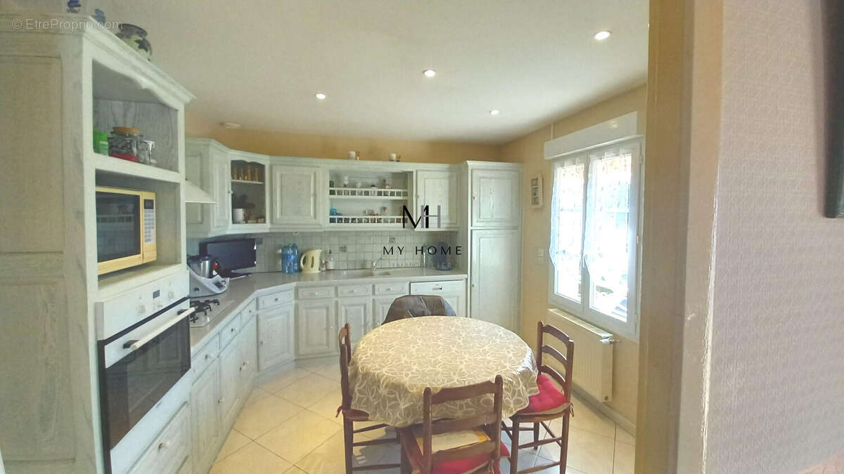 Maison à SAINT-LANGIS-LES-MORTAGNE