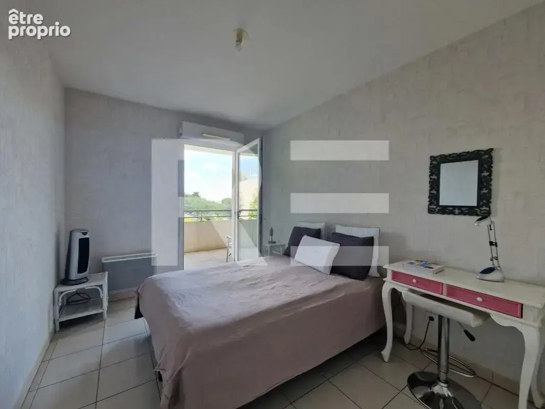 Nimes appartement 63 m² avec 2 chambres terrasse de 18 m² et garage - photo 6
