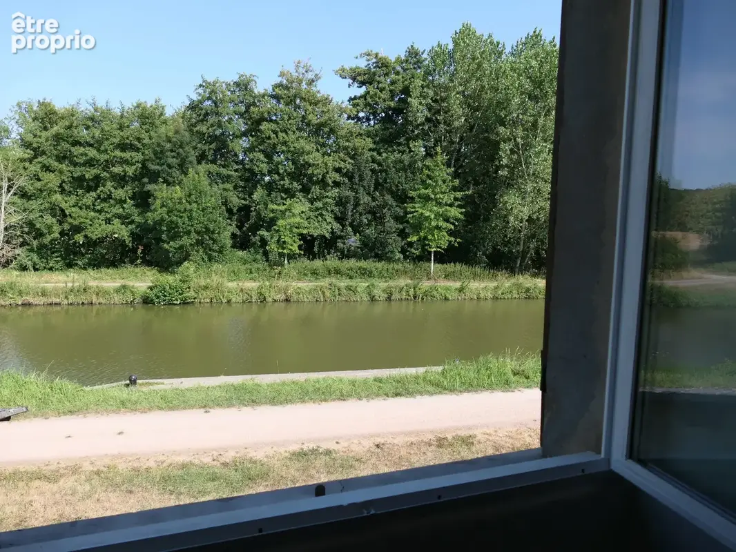 Emnsemble immobilier borde par le canal du nivernais - photo 11