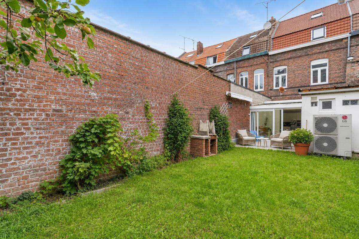 Maison de 6 pièces de 142 m² située à Tourcoing - photo 12