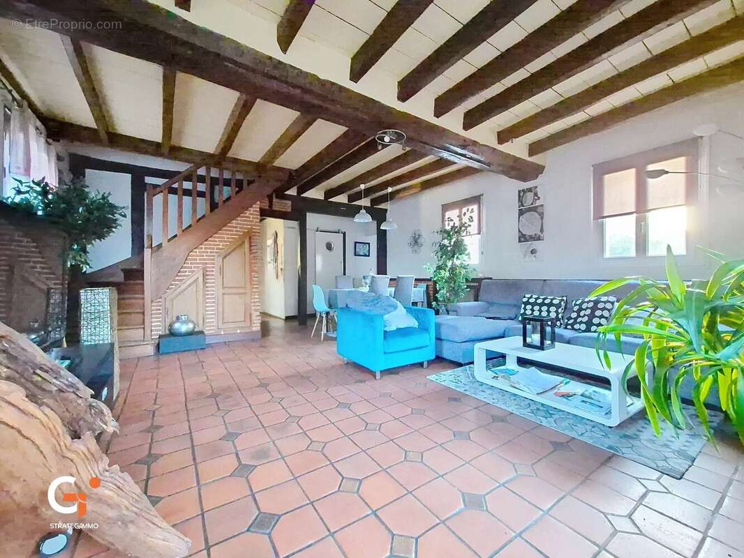 Maison à SAINT-OUEN-DE-THOUBERVILLE