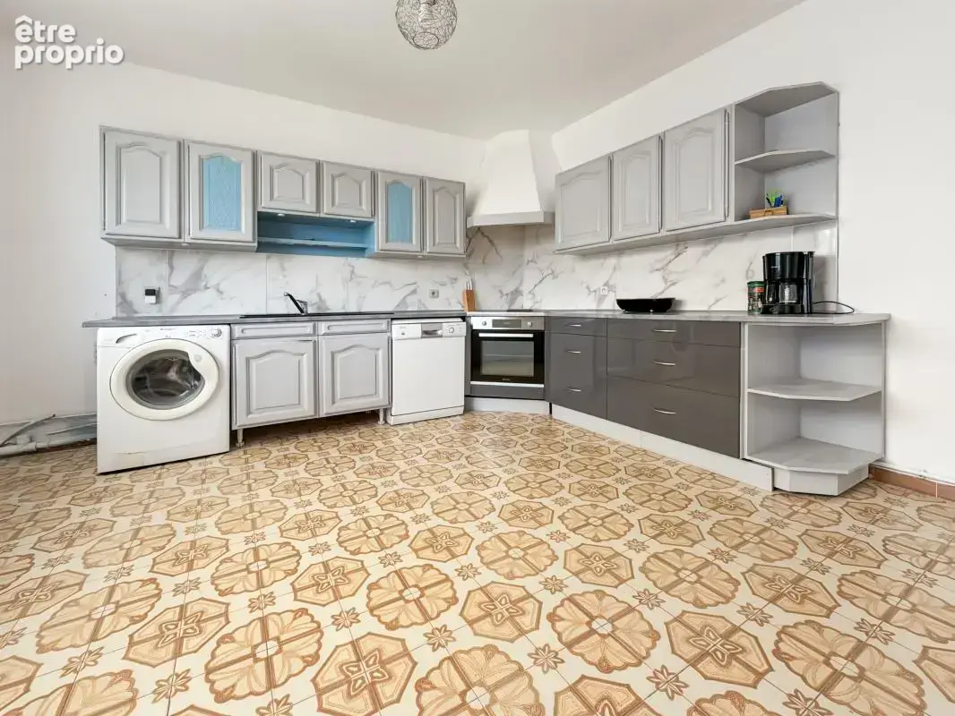 Coup de cœur à Guilherand-Granges – Appartement T4 de 103 m² + 39m² de comble aménageable avec balcon & jardin - photo 2