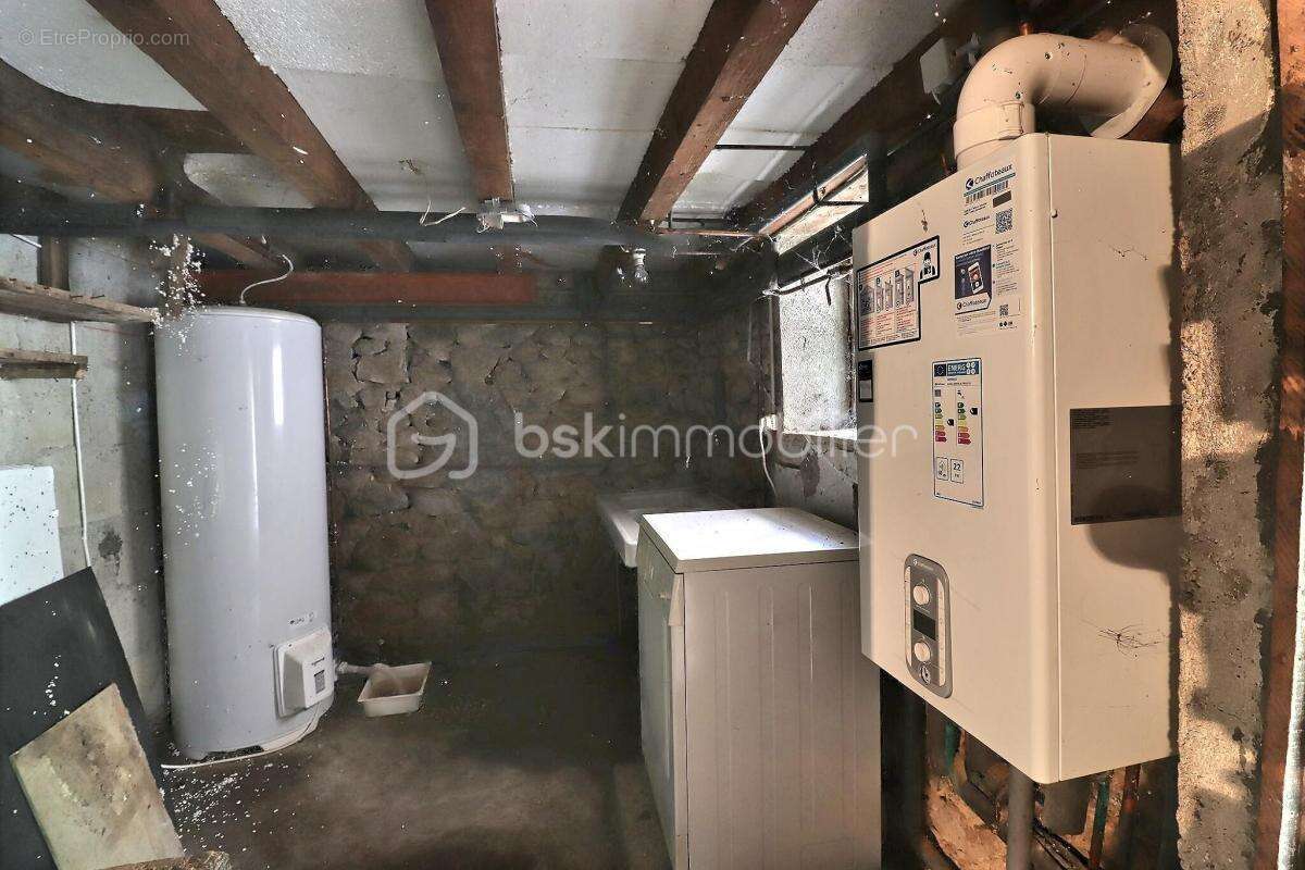 Maison mitoyenne 97.50m² 63300 Escoutoux - photo 13