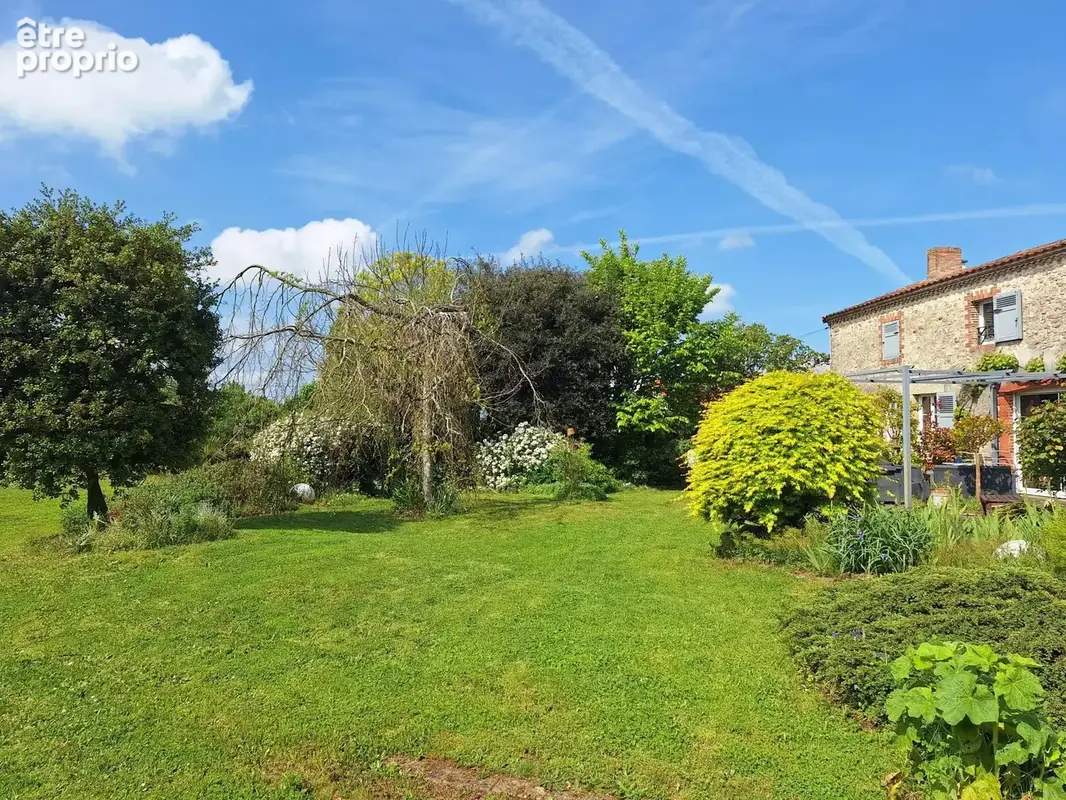 MONTBERT Maison pleine de charme sur très joli jardin - photo 6