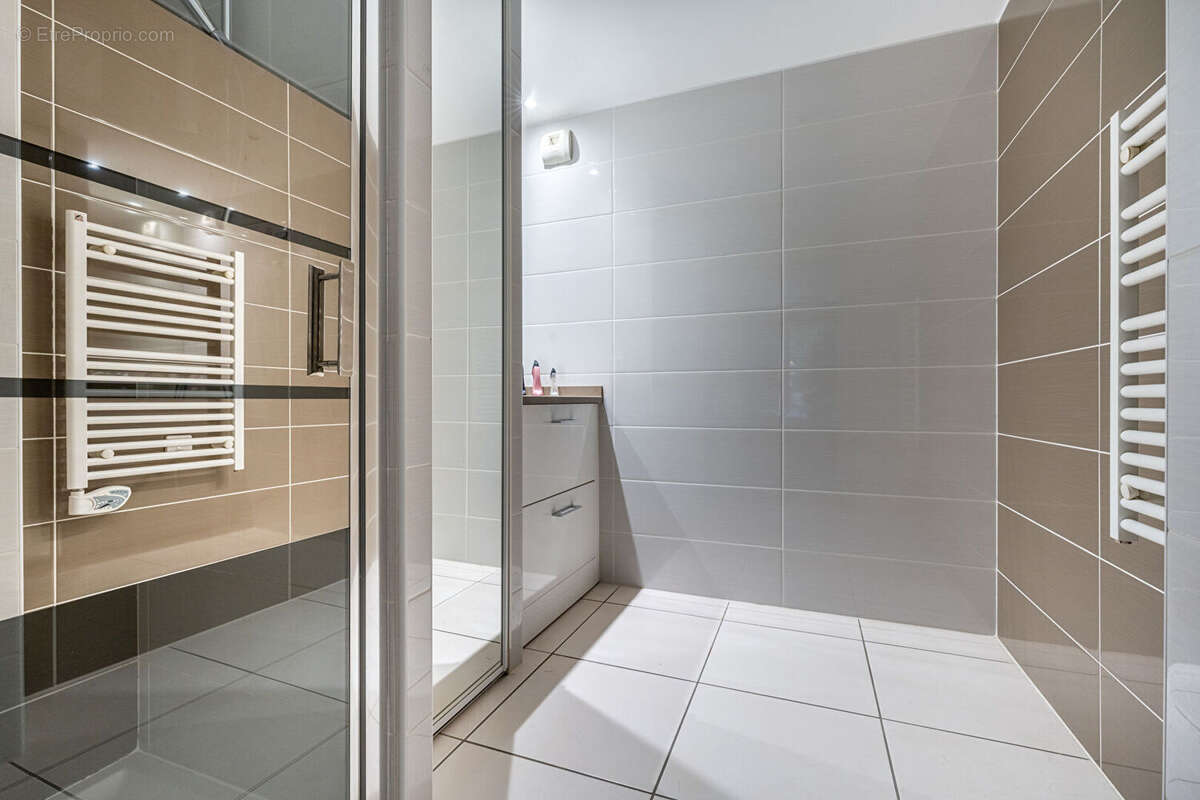 SOUS COMPROMIS Rez-de-Jardin de 4 pièces - Ecully - photo 12