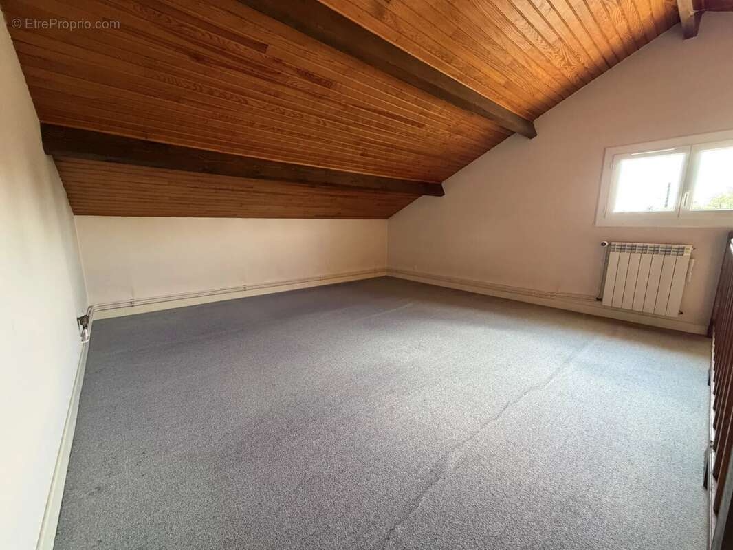 Maison de 152m2 habitable avec véranda et garage sur un jardin de 641m2 - photo 8