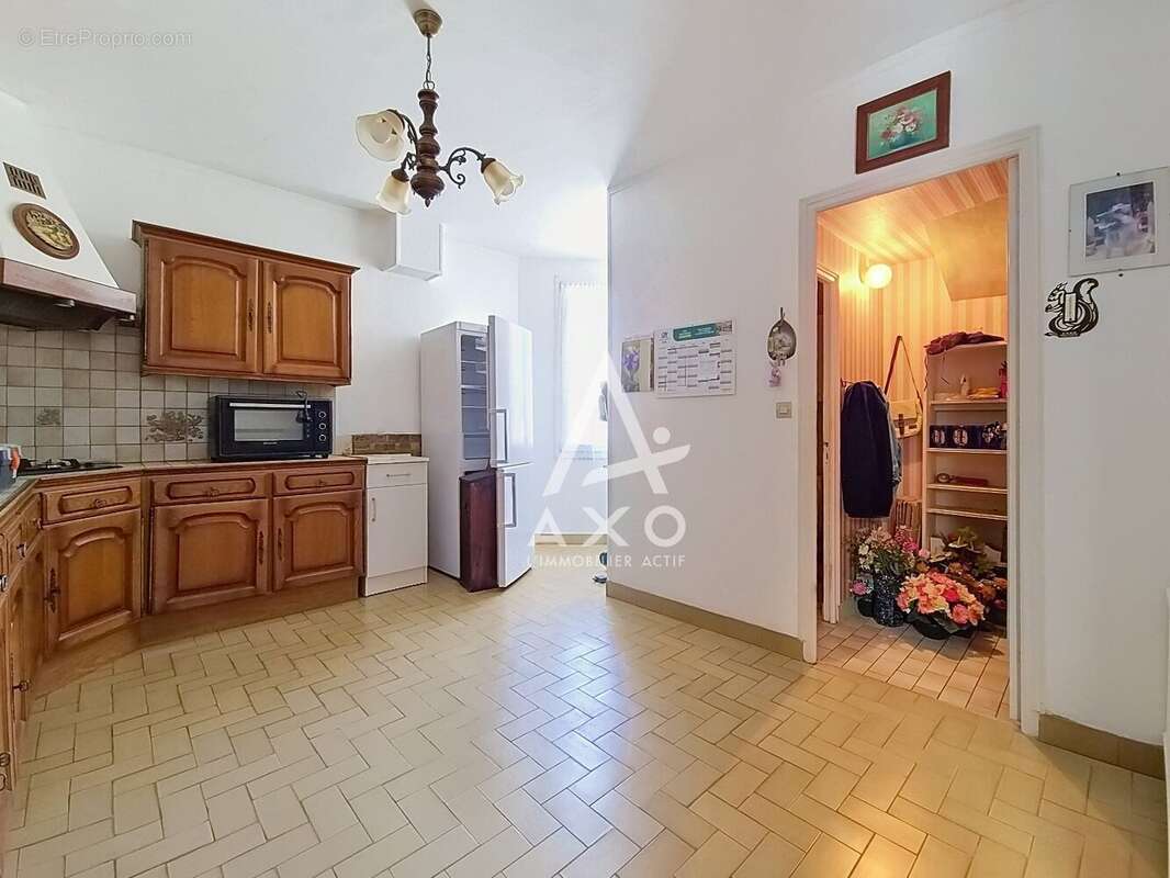 Maison en brique à Auneuil avec 2 chambres, véranda et jardin clos - photo 5
