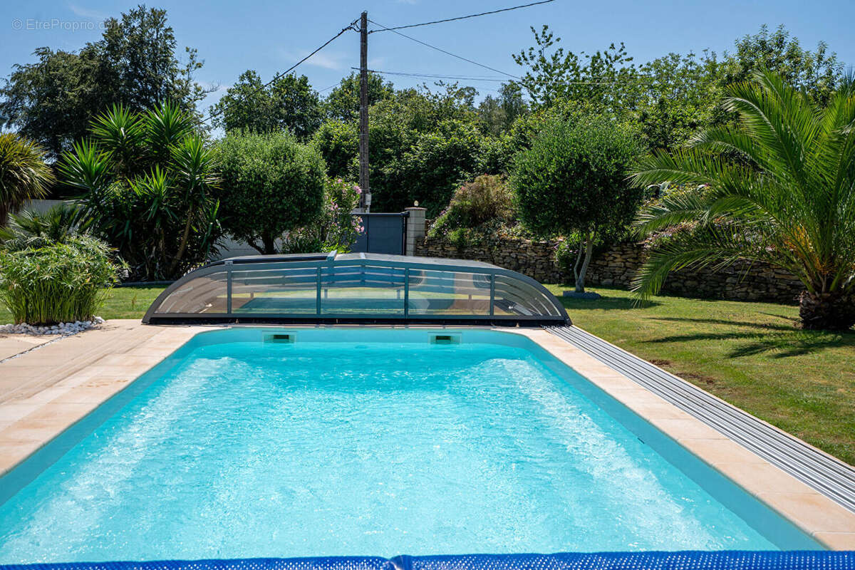 MELGVEN - Maison T5 de 103 m², avec piscine située en impasse et sur une parcelle de plus de 1200 m² - photo 16