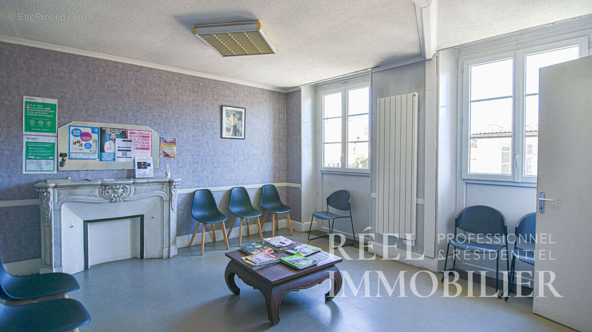 Immeuble de rapport au coeur de la basse ville - photo 11