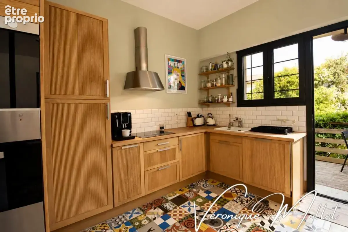 Maison en pierre indépendante sur 1000m2 de parcelle arborée à pieds de tous commerces - photo 5