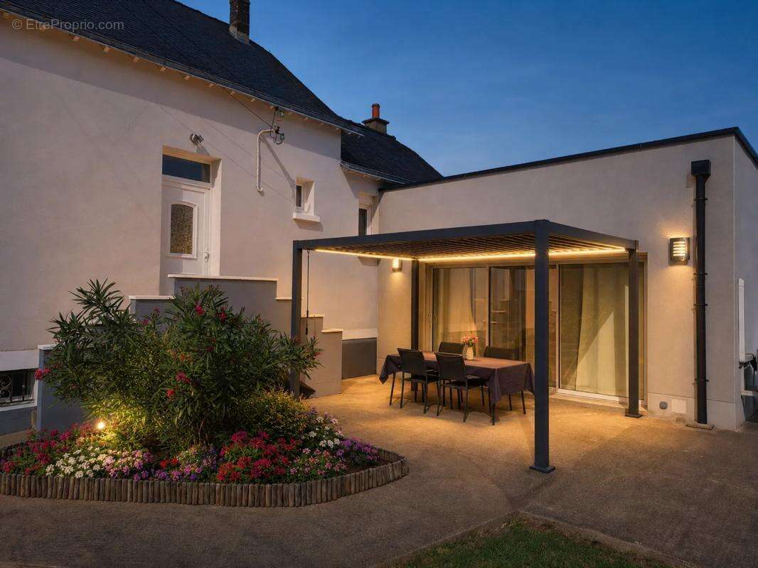 Maison de 5 pièces de 104 m² à Laval - photo 3