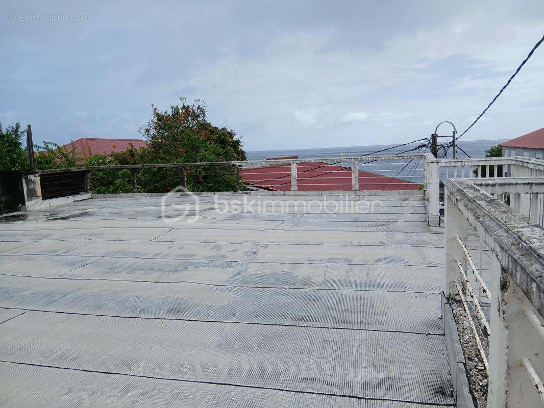Immeuble d’exception au cœur de Basse-Terre avec rooftop et vue mer - photo 12