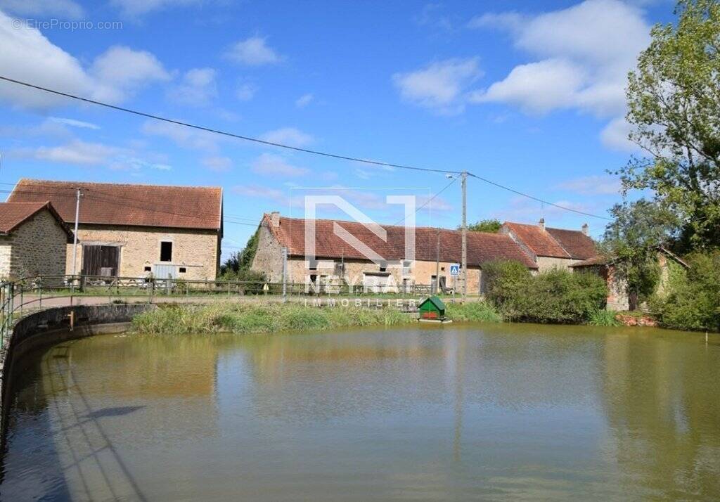 Maison à MALIGNY