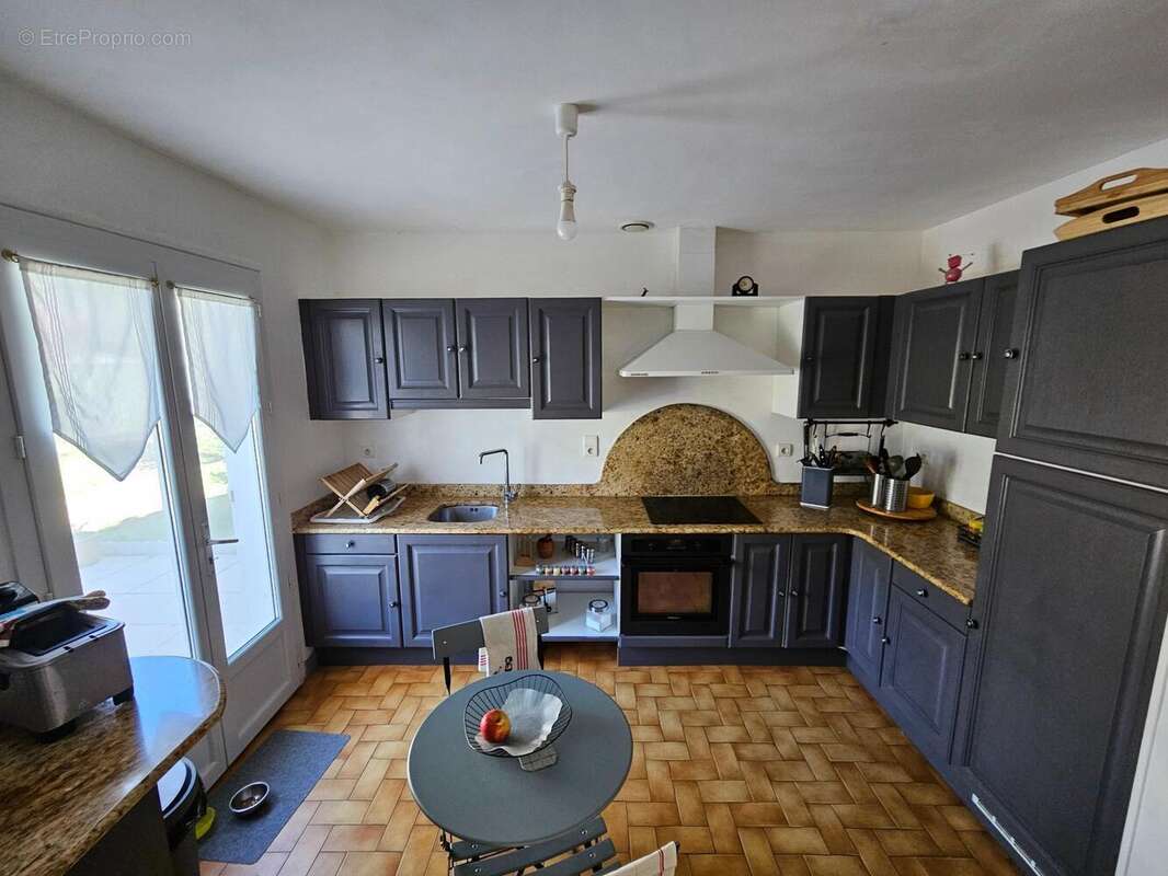 Photo 3 - Maison à SAINT-REMY-EN-ROLLAT