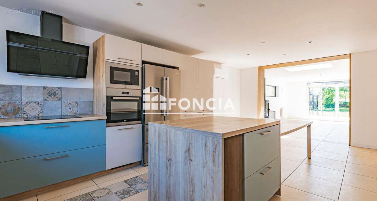Maison familiale de 145 m² avec 4 chambres, grand jardin, terrasse et garage à Tours-sur-Marne - photo 2