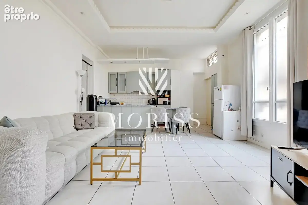 Appartement trois pièces - rue simart - 75018 paris - photo 4