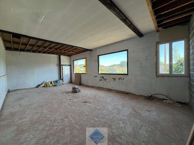local d'activité transformable en habitation - photo 2