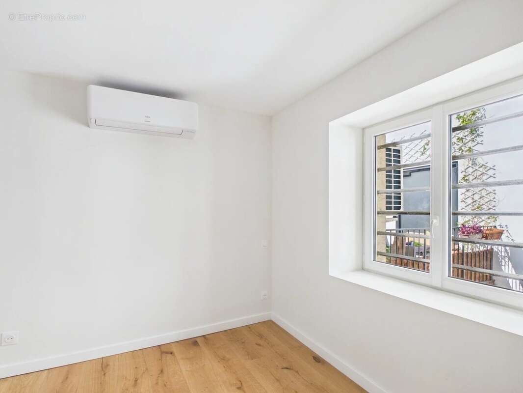 Duplex au charme historique de 102 m² - photo 6