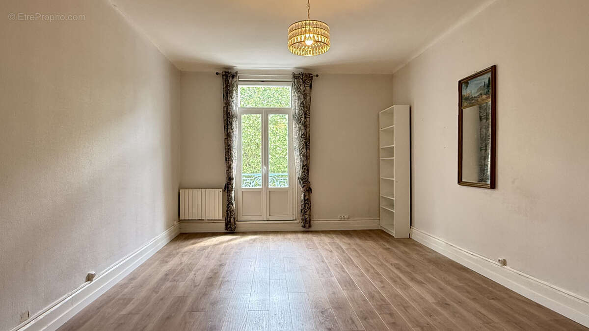 Appartement T3 face au parc des Sources avec balcon et ascenseur - photo 4
