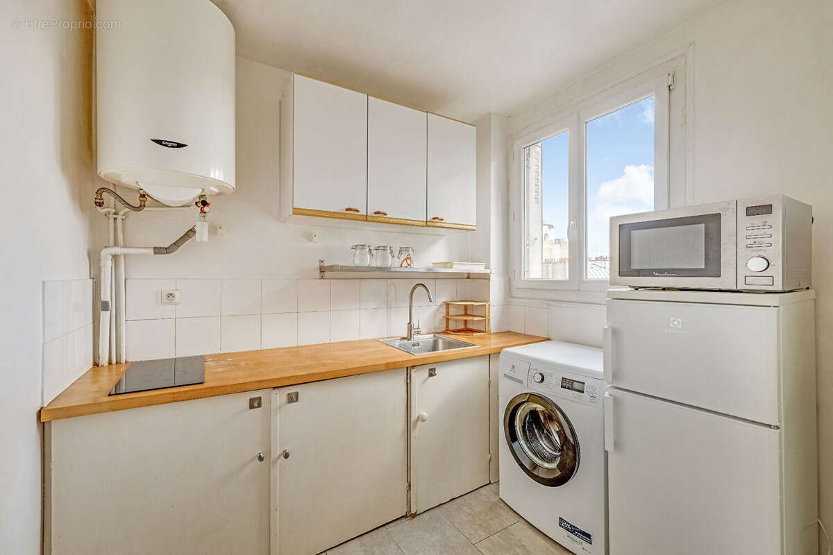 Appartement Paris 2 pièce(s) 40 m2 - photo 10