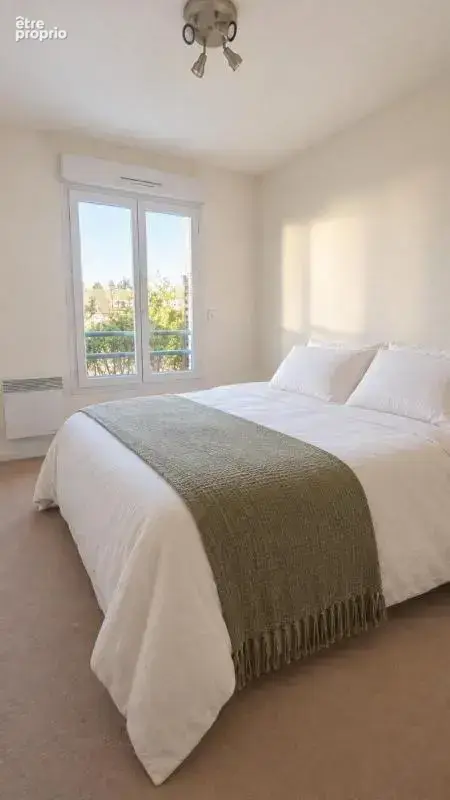 Appartement lumineux en rez-de-jardin avec place de parking - photo 5
