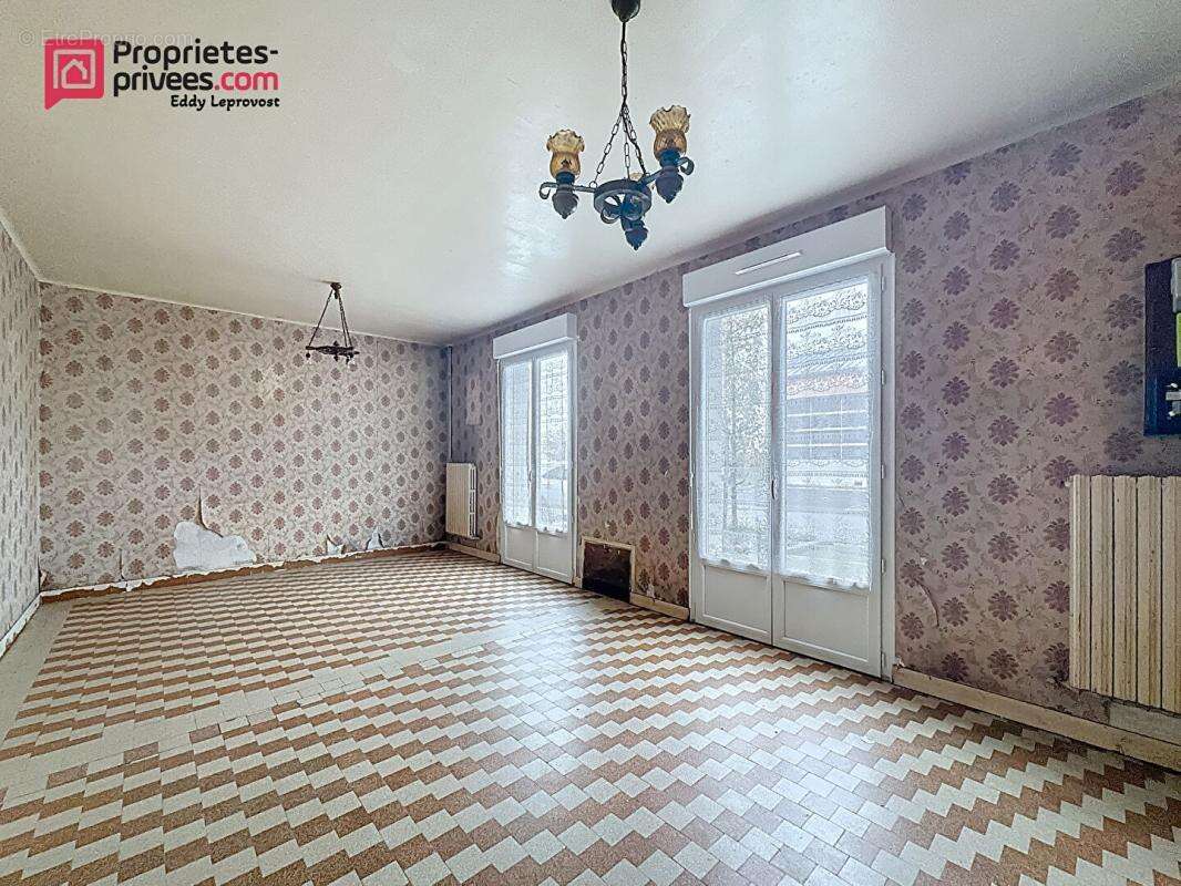 Maison à JUVIGNY-LE-TERTRE