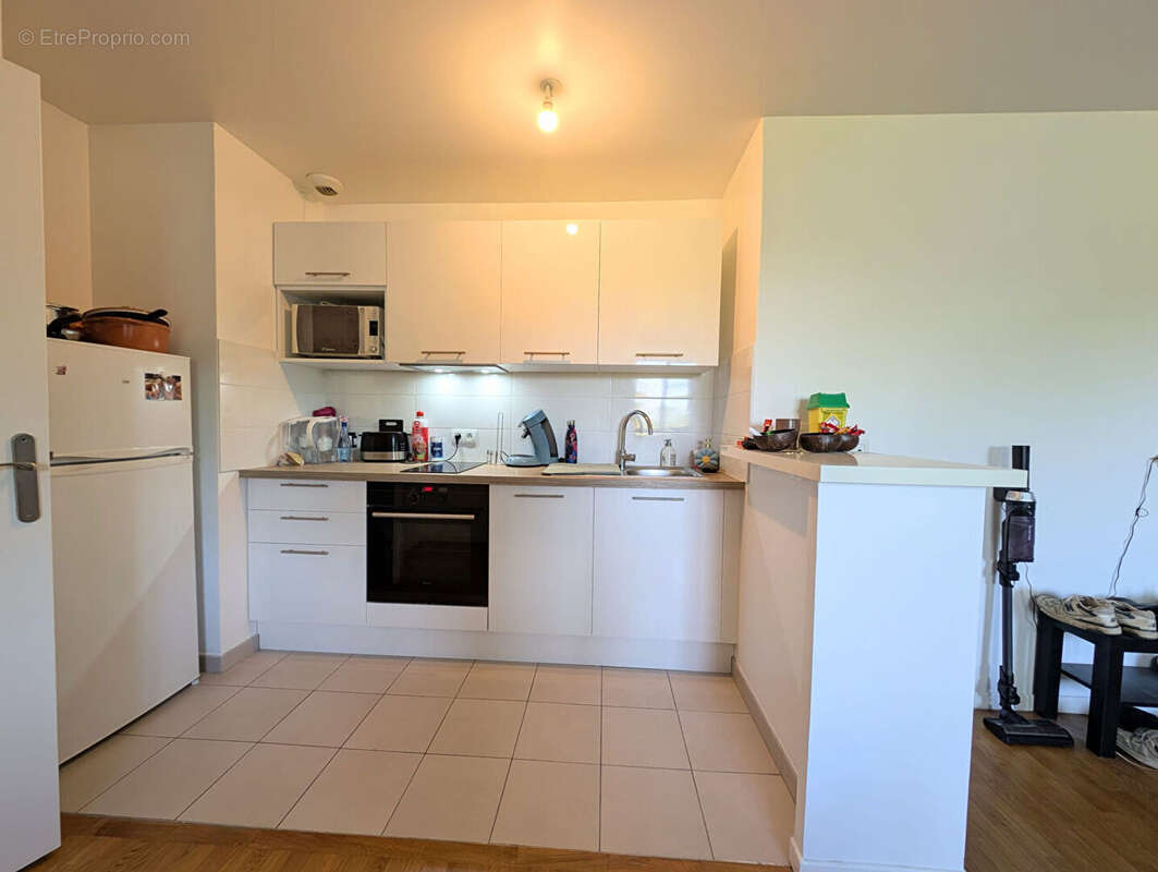 SARTROUVILLE - Appartement 2 pièces de 58 M² avec cave et parking en sous-sol - photo 6