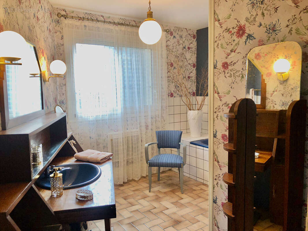 À l'abri des regards, maison chaleureuse où confort, intimité et douceur de vivre se rencontrent. - photo 11