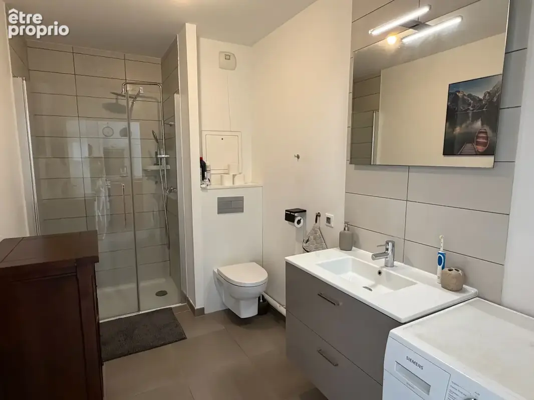 EXCLUSIVITÉ – Appartement récent, balcon, parking et gare à pied : un 2 pièces prêt à vivre ! - photo 8