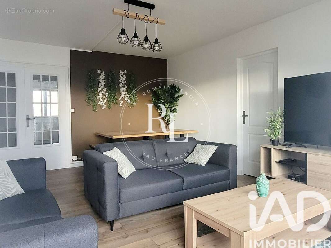 Photo 2 - Appartement à HEROUVILLE-SAINT-CLAIR