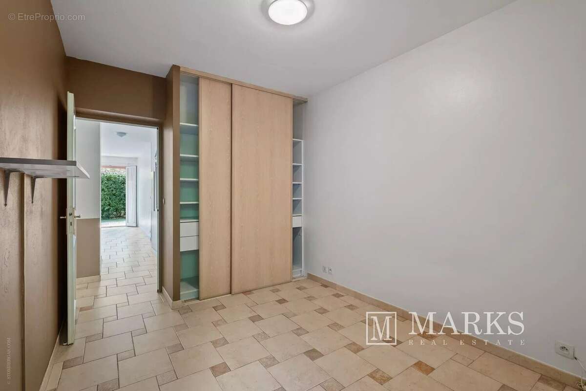 Appartement de 2 chambres avec terrasse, jardin et garage - photo 11