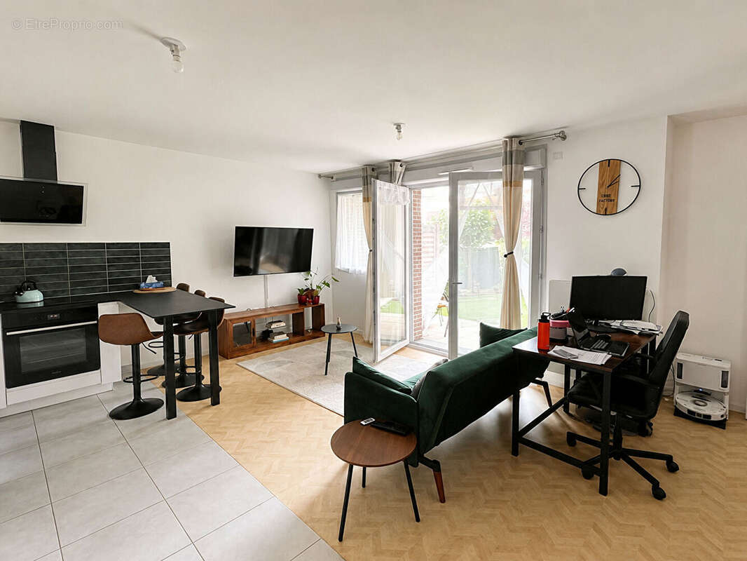 Appartement 2 pièces avec jardin et parking dans une résidence récente - photo 3