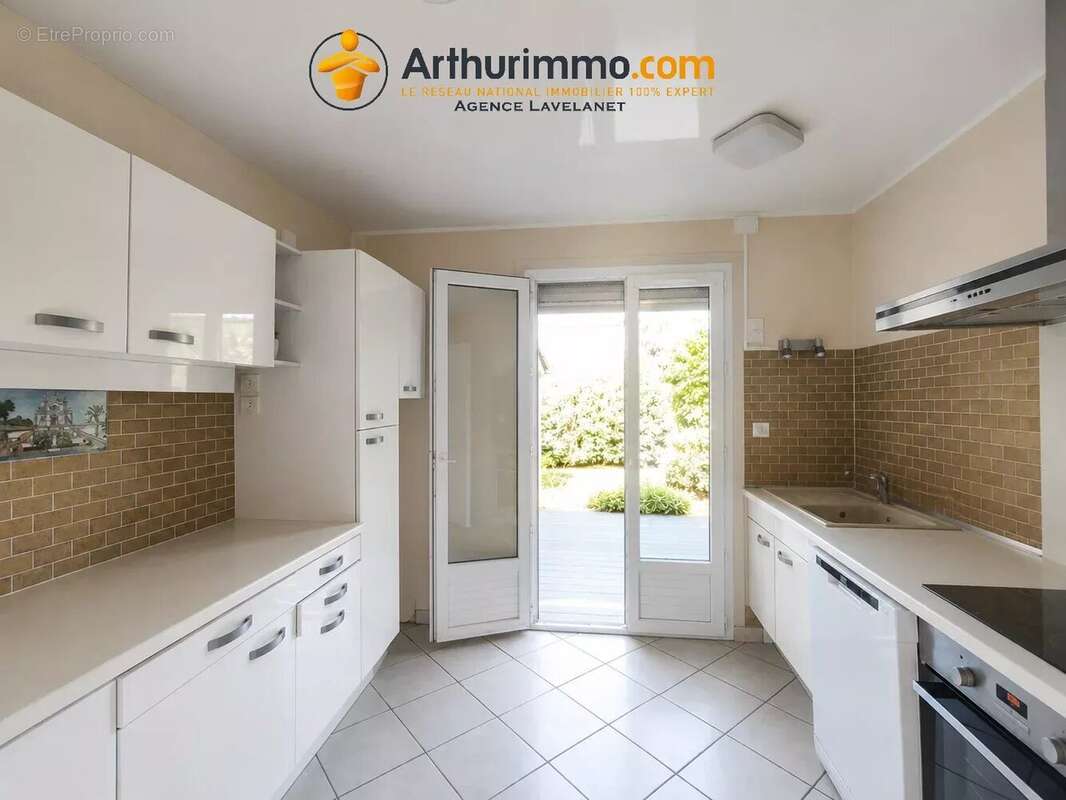 Maison familiale 96m²- double garage- jardin 1100m² - photo 5