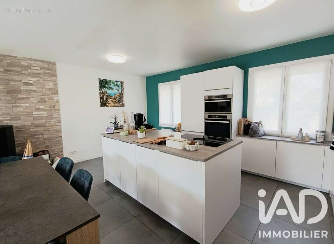 Maison 88 m² à Oiry  - photo 7