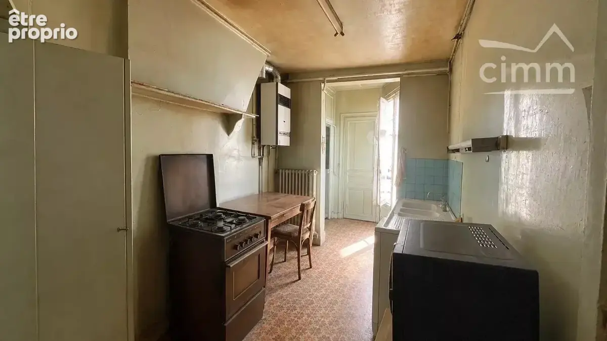 Rare :  Paris 10ème - Plateau entier post-haussmannien de 100 m² traversant à rénover - photo 11