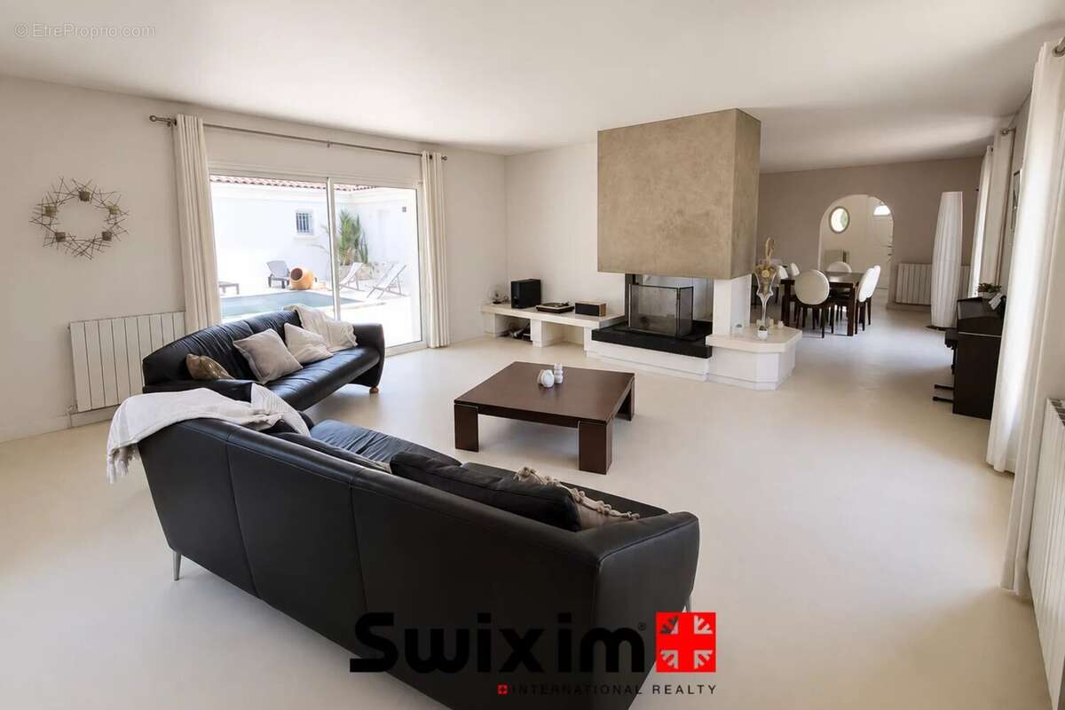 Propriété de 7 piéces avec un appartement de type T3. - photo 4