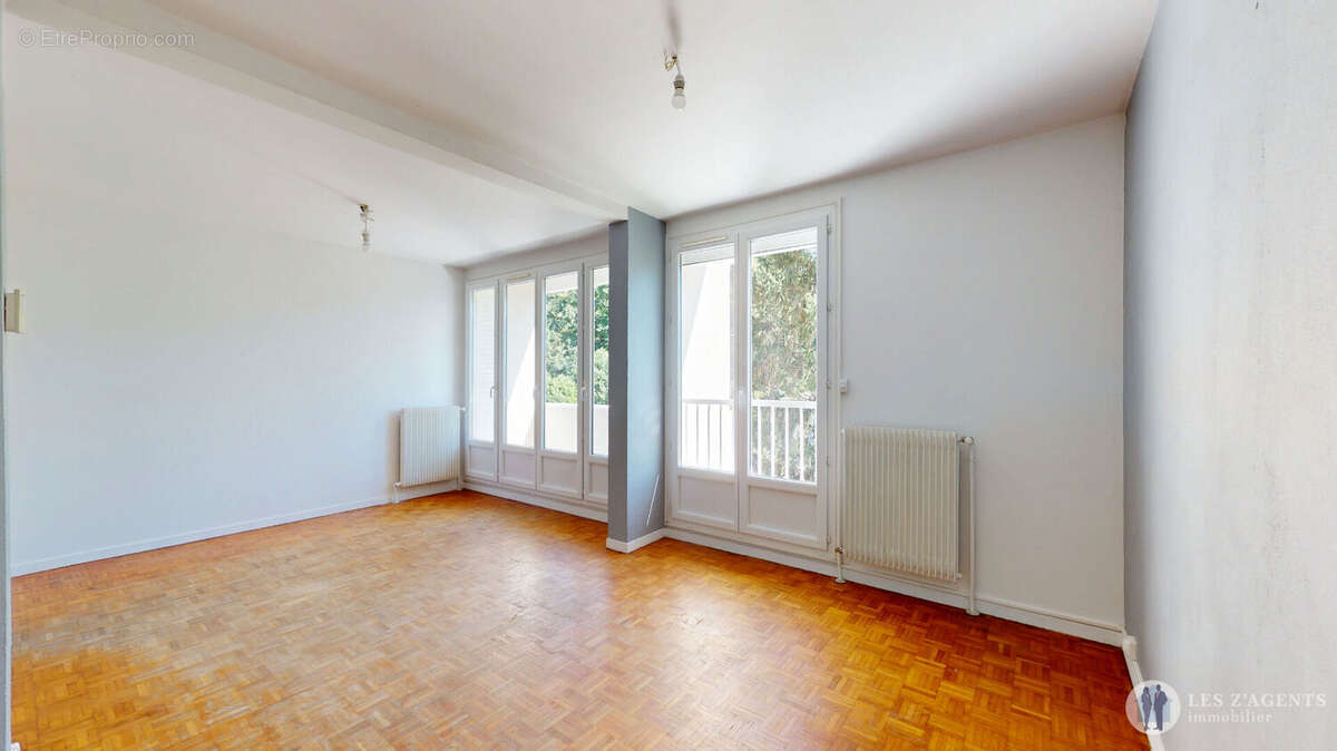 Appartement T3 de 64m2 avec balcon + cave + place de parking - photo 2