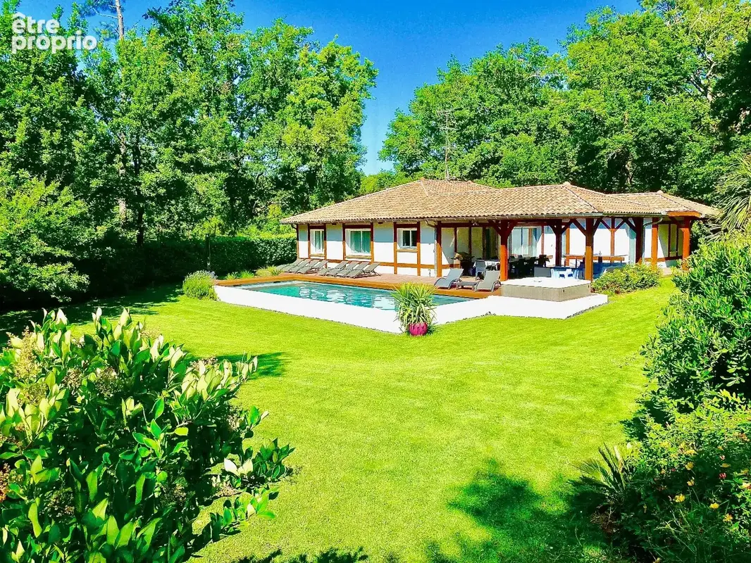 Entre Forêt Landaise et Art de Vivre  Ensemble de deux maisons sur 1638 m² de terrain boisé. - photo 17