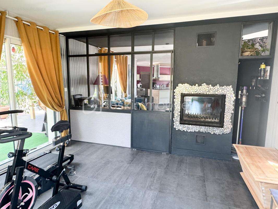 Maison de plain-pied 4 chambres 130m2 + véranda de 45m2 - photo 9