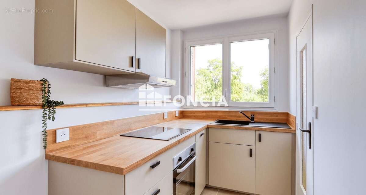 Appartement t3 proche toutes commodites, avec garage, cave et balcon, entierement renove avec prestations de qualite - photo 4
