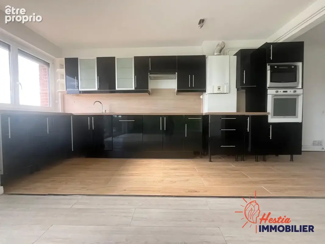 Appartement 5 pièces 82 m² à vendre à Reims (51100) - photo 4