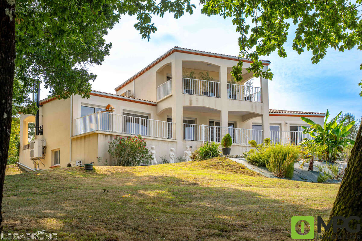 VILLENEUVE SUR LOT, maison contemporaine d'environ 220 m2, 3 chambres et bureau avec vue exceptionnelle, doubl - photo 2