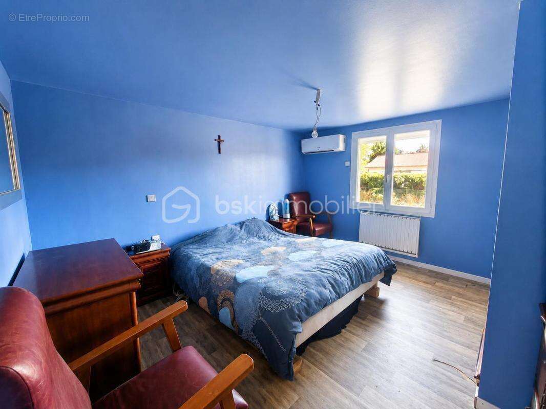 Propriété familiale où espace, confort et sérénité se rencontrent - photo 13